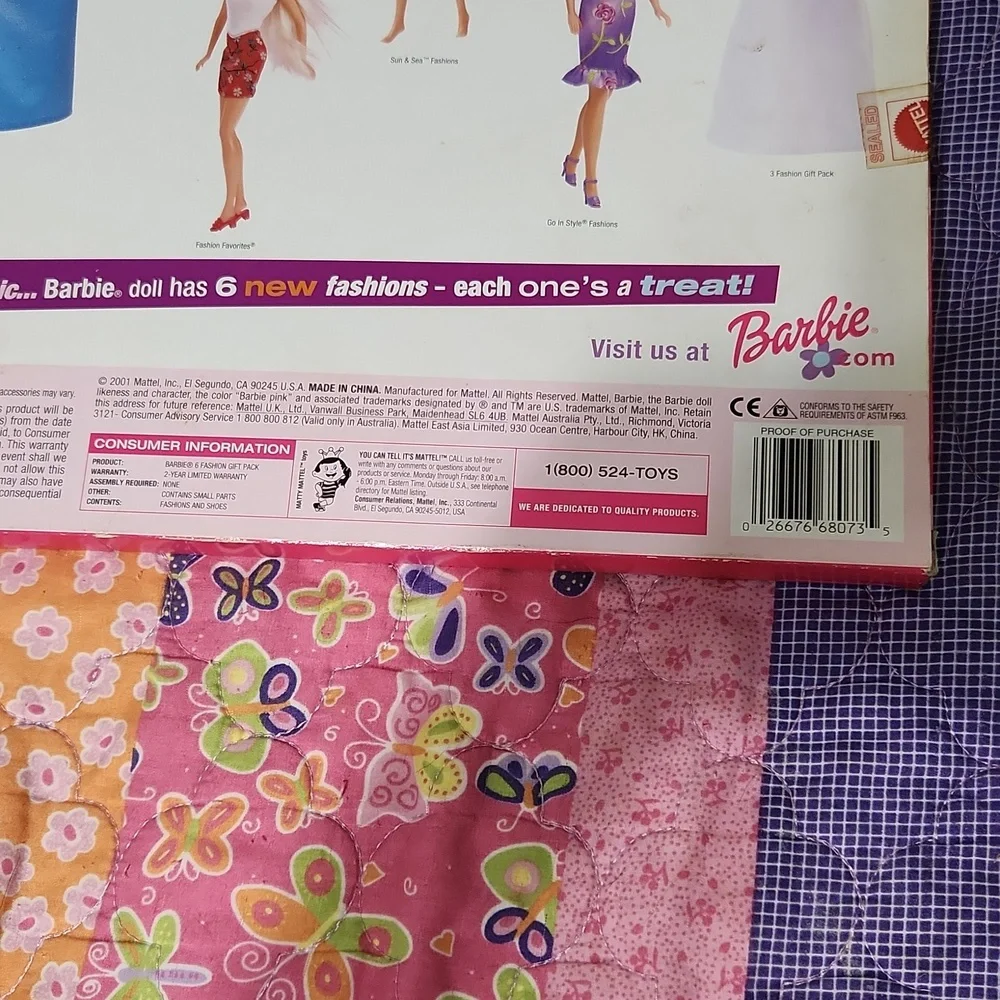Brand New never opened Barbie fashions.